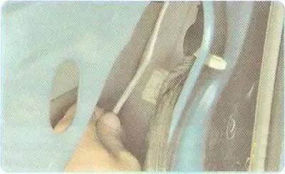 6. Pull the handle back and remove it.