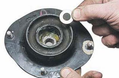 Как поменять передние стойки на шевроле ланос Removal of the shock absorber and its disassembly (Chevrolet Lanos T150 2002-200