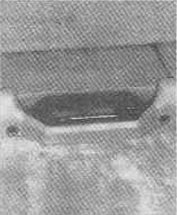 Move the seatback release lever on the right rear side of the seat toward the center of the vehicle.