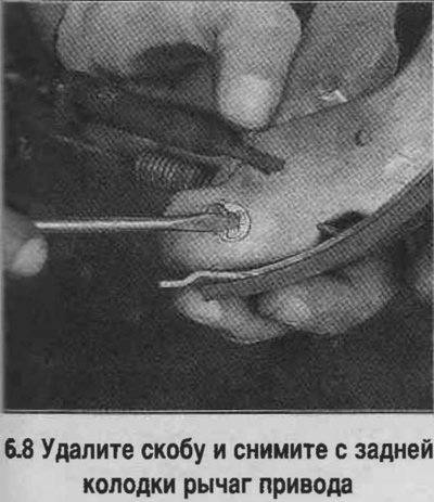 8. Távolítsa el a felső visszatérő rugó egységet a szabályozó csappal együtt. Távolítsa el a…